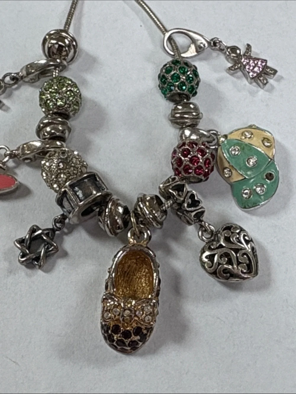 Silver-Tone Charm Necklace with Pink, Green and Gold Accents